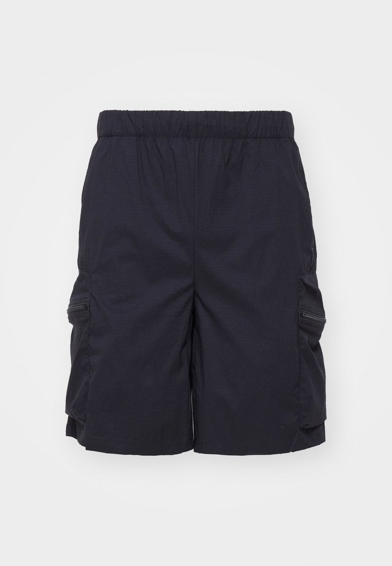 Námořnické modré cargo šortky s elastickým pasem, obsahující dvě boční kapsy na zip a texturovanou látku. Navrženy pro pohodlí a praktičnost.