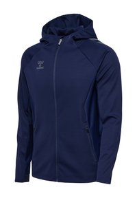 Marineblauwe capuchonvest met lange mouwen, ritszakken aan de zijkant en het hummel-logo op de linkerborst en schouder.