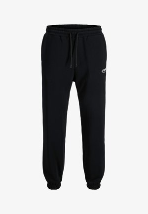Zwarte joggingbroek gemaakt van zachte elastische katoenstof, met een elastische tailleband, trekkoordsluiting en geribde boorden. Kleine logodetail.