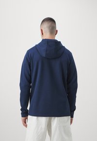 Puma FENERBAHCE ISTANBUL CASUALS HOODED - Klubové oblečení - club navy/speed yellow