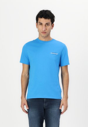 Guess Jeans SLIM AMERIC - Basic T-shirt - blue toulouse