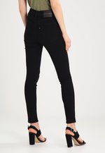 Levi S Line 8 Levis Line 8 High Skinny Jeans Skinny Fit Carbon Black Denim Zalando Nl