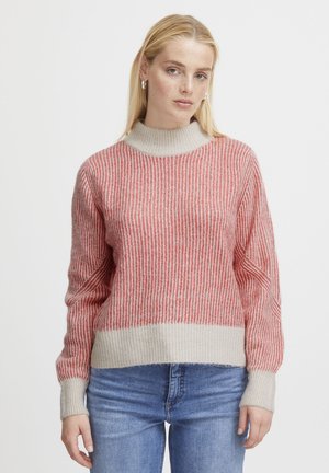 Strickpullover mit hohem Kragen, gestreiftem Muster in Rottönen und Beigetönen, gerippter Textur und leicht übergroßer Passform.