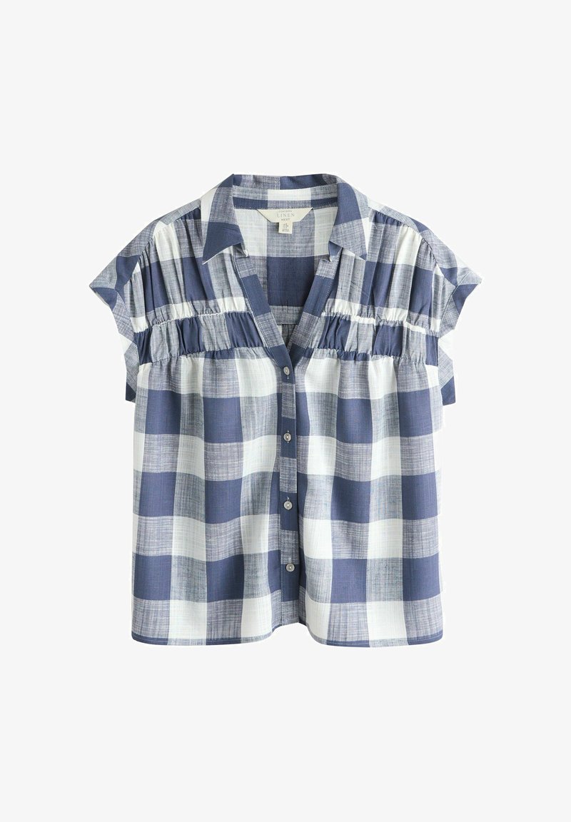 Kortærmet skjorte i marineblåt og hvidt ternet mønster, med knaplukning foran, krave og rynket tekstur langs skuldrene.