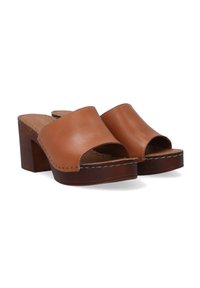 Braune Leder-Slide-Sandalen mit offenen Zehen, Blockabsätzen und beigem Nähen. Elegantes Design mit glatter Textur und robuster Sohle.