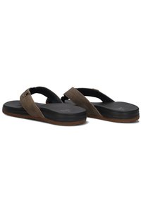 Brown flip-flops with perforated fabric straps, rubber soles, and a textured surface. Designed for comfort and casual wear.