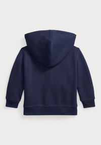 Sudadera para niño pequeño de color azul marino con mangas largas, puños y dobladillo de canalé, mostrada desde la parte posterior sobre un fondo blanco.