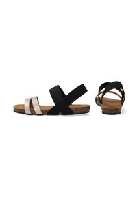 Zwarte en metallic sandalen met een kurken voetbed, voorzien van brede kruislussen en een platte zool. Zachte textuur en minimalistisch ontwerp.