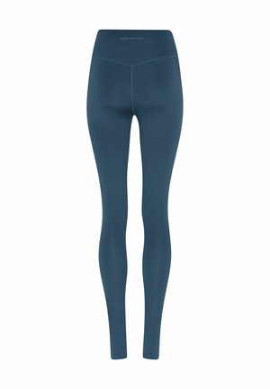 Temno zeleno-modre majhne hlačne nogavice z visokim pasom in polno dolžino, z vidnimi šivi in napisom "GIRLFRIEND" na zadnjem pasu.