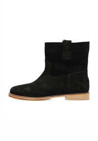Black suede ankle boots with a smooth texture and a low wooden heel. Features a loop at the back and subtle stitching details.