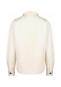 Crème-kleurige button-up jacket met een kraag en lange mouwen. De stof lijkt glad; de manchetten hebben zwarte knopen voor sluiting.