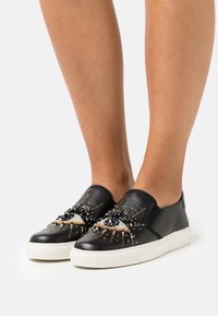 kurt geiger eye sneakers
