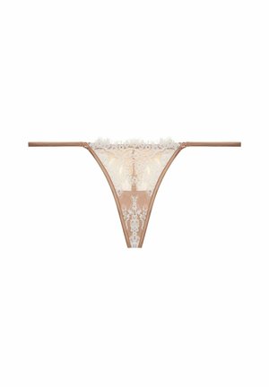 String beige en dentelle avec broderie florale, panneau avant transparent et fines bretelles latérales. Caractérisé par un bord en dentelle festonnée pour un détail supplémentaire.