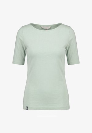 Lichtgroen strakvallend T-shirt met korte mouwen, ronde hals en een klein zwart labeltje vlak bij de onderzoom.
