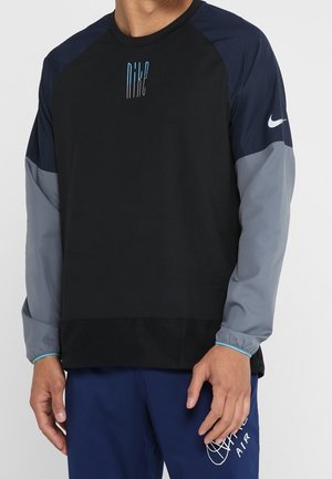 Tekninen t-paita - black
