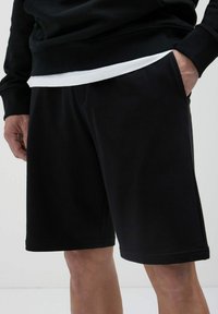 Calliope GINNICO - Pantalon de survêtement - nero