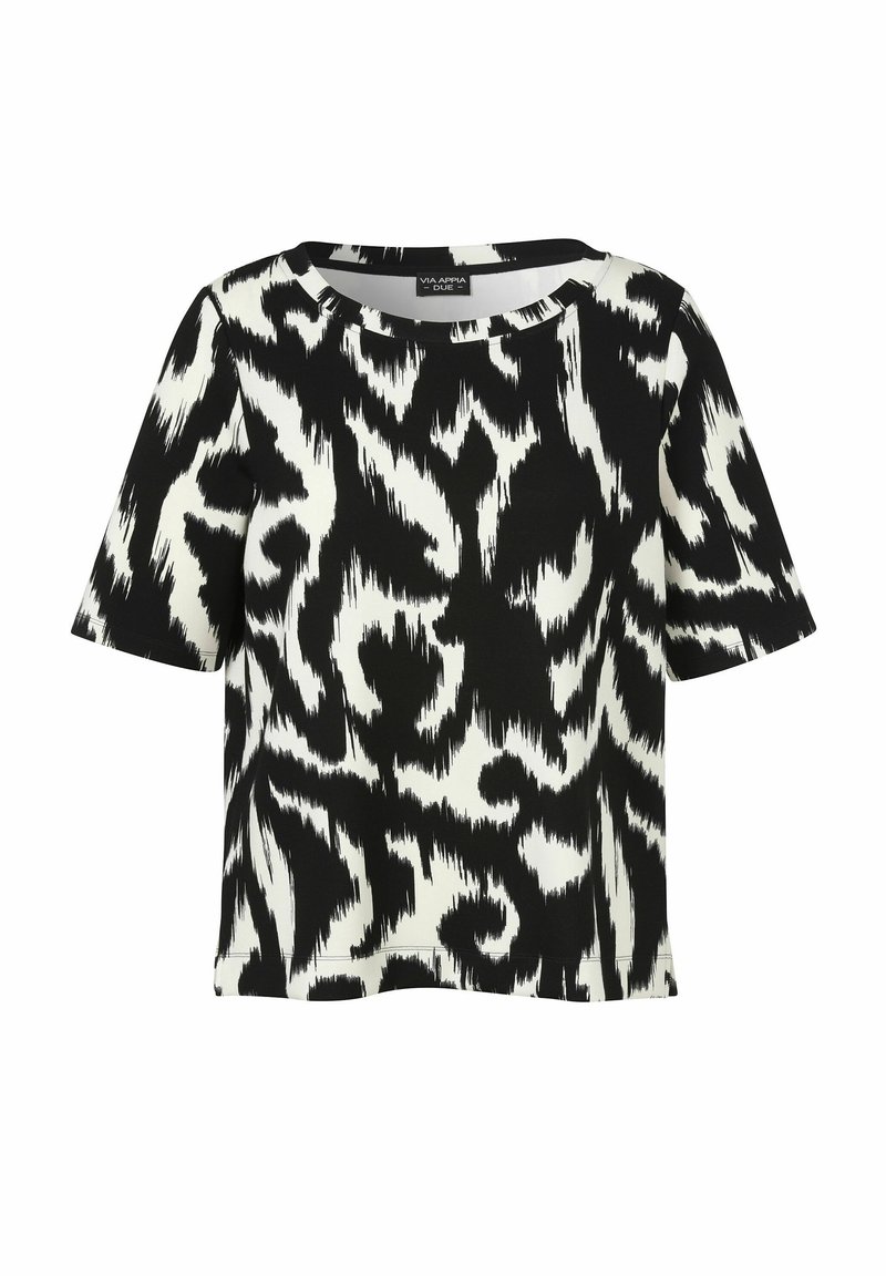 Haut à manches courtes noir et blanc présentant un motif abstrait. Fabriqué dans un tissu lisse avec une coupe ample et un col rond.