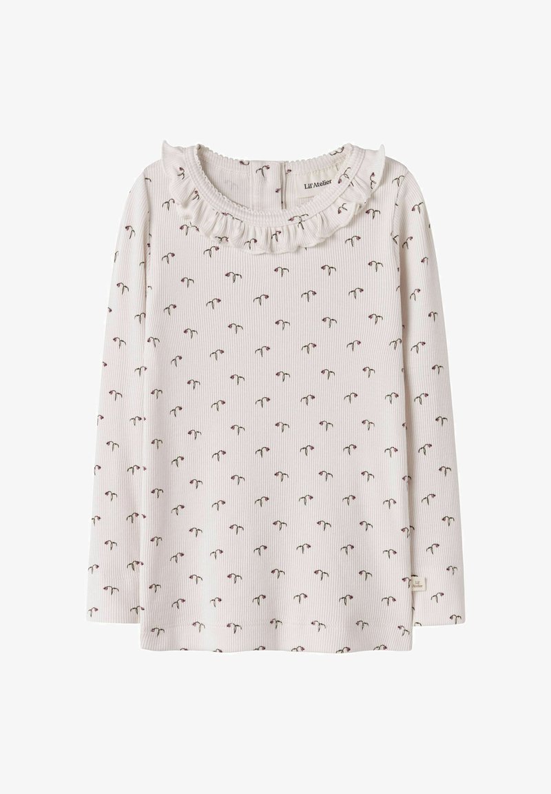 Langærmet bomuldsbluse med ribbet tekstur, lys cremefarve, rynket halsudskæring og små blomsterprint i pink og grøn over det hele.