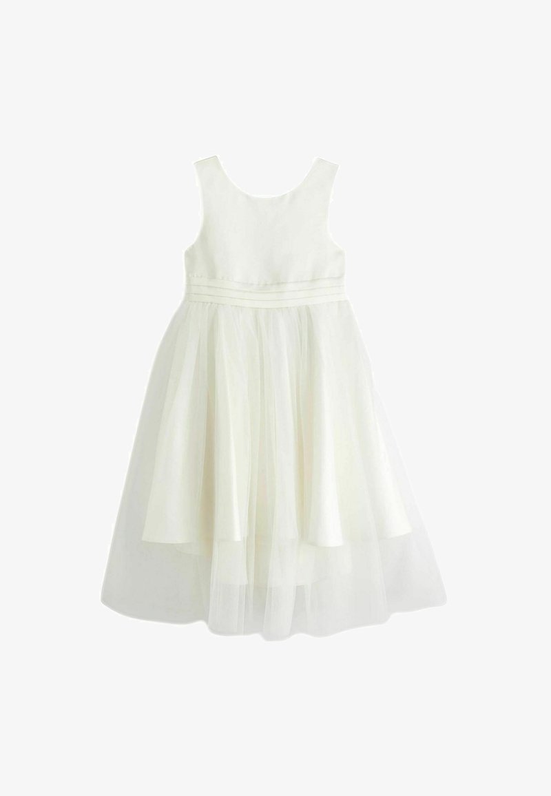 Robe blanche avec un design sans manches, un corsage ajusté et une jupe en tulle superposée. Dotée d'une taille texturée et d'un ourlet midi.
