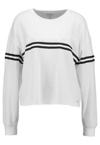 Vit långärmad sweatshirt i strukturerad stickning, med två svarta horisontella ränder över bröstet. Ribbad i ärmslut och nederkant.