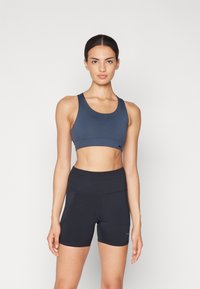 Salomon CROSS RUN BRA  - Športni modrček z močno podporo - midnight navy/deep black