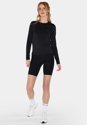 Girlfriend Collective, RESET FITTED LONG SLEEVE TEE - Langarmshirt - black