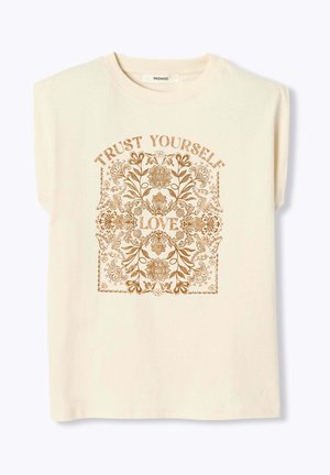 Débardeur couleur crème avec un motif floral marron et le texte « FAIS CONFIANCE À TOI » en haut et « AMOUR » au centre.