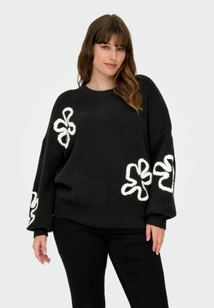 Schwarzer Strickpullover mit weißer floralem Stickerei an den Ärmeln. Mit lässiger Passform, rundem Ausschnitt und strukturiertem Stoff.