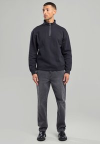 America Today DELTA - Vaqueros boyfriend - washed black