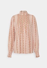 Blouse rose à manches longues avec un petit imprimé floral rouge vertical, col montant volanté et poignets volantés.