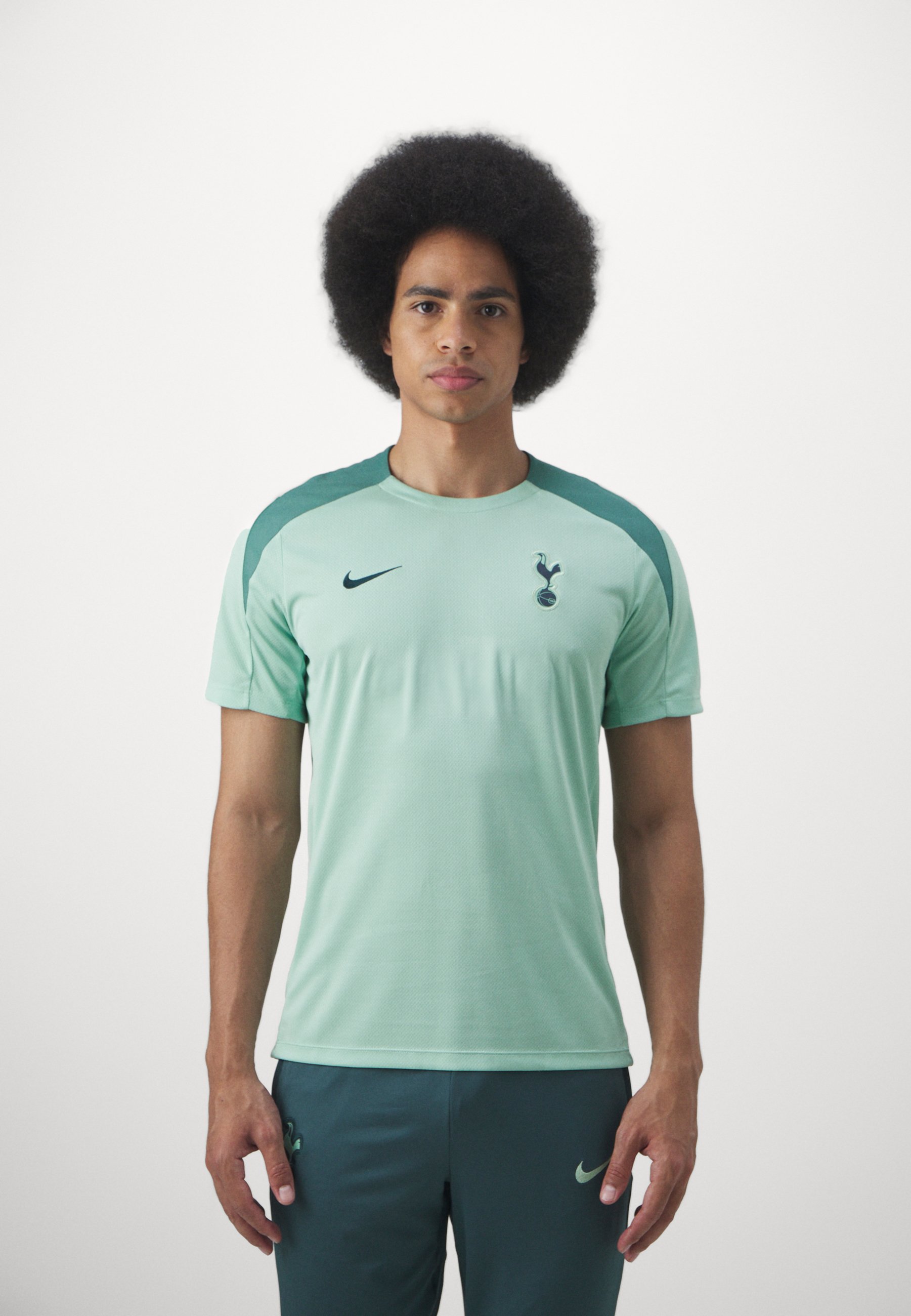 enamel green nike shirt