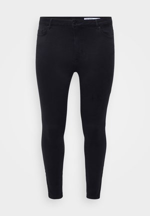 Jean slim noir en denim extensible, avec une fermeture à bouton à l'avant, des passants de ceinture et cinq poches, offrant une texture lisse.