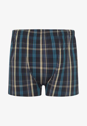 Rutiga kalsonger med blå, gula och svarta linjer. Elastisk midja och mjukt tyg med en figurnära passform.