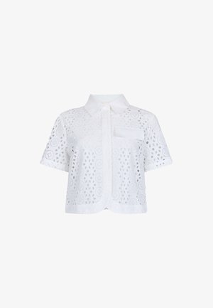 Camicia bianca a maniche corte realizzata in tessuto di pizzo ricamato con ritagli circolari, dotata di colletto a punta e taschino sul petto.