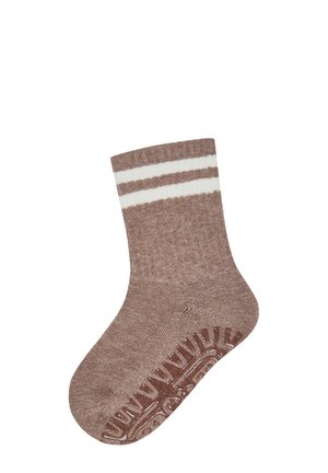 Brown knit sock with white double stripes near the cuff and textured non-slip grip pattern on the sole.