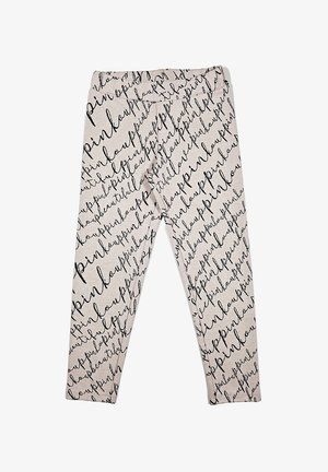 Pantaloni slim-fit beige chiaro con un motivo di testo corsivo nero ripetuto che copre l'intero tessuto.