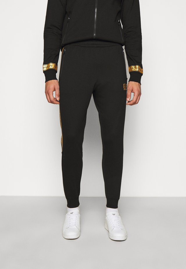 Pantalon de survêtement - black/gold
