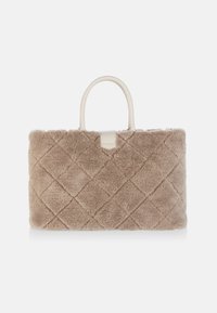 Beige fluffy handbag with quilted texture, rectangular shape, and light-colored handles. Features a smooth leather accent at the top.