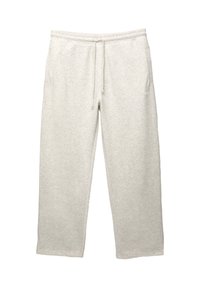 Lichtgrijze sweatpants van zachte stof, met een trekkoord in de taille, zijzakken en een relaxte pasvorm met iets taps toelopende pijpen.