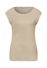 Beżowa damska bluzka z krótkim rękawem, z okrągłym dekoltem, dopasowanym krojem i małą metką z napisem "Street One" wewnątrz kołnierza.