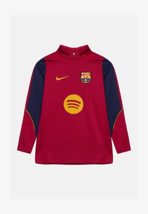 Czerwona i granatowa sportowa koszulka z długim rękawem, zamkiem do ćwiartki, herbem klubu Barcelona, logo Nike i żółtym logo Spotify z przodu.