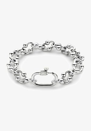 Bracciale in argento con sfere ovali e rotonde lisce interconnesse, chiuso con una clip decorata con un piccolo dettaglio scintillante.