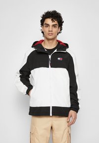 Tommy Jeans CHICAGO UNISEX - Allvädersjacka - black/deep crimson/white