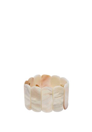 Stretch bracelet with smooth, polished, elongated oval cream-colored shell pieces arranged side by side.