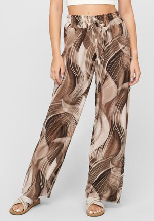 Cream and brown patterned wide-leg pants with a drawstring waist, featuring curved lines and a smooth, lightweight fabric texture.