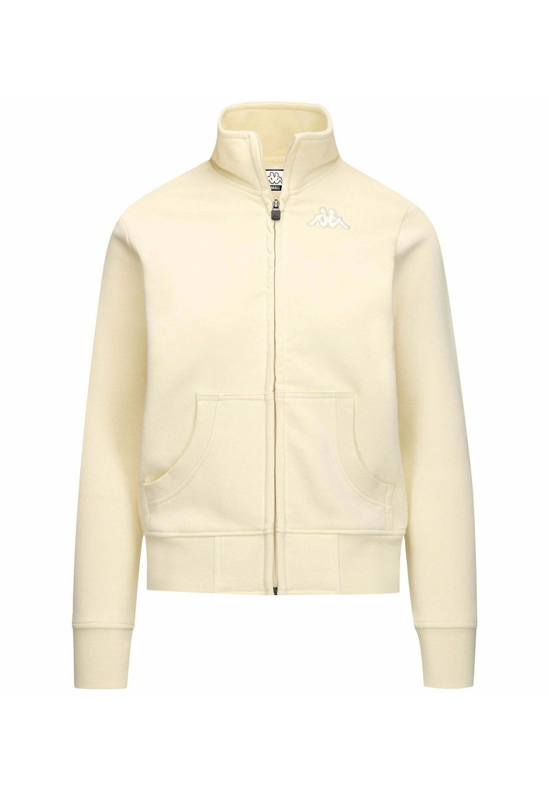 Felpa cremosa con zip e colletto alto, due tasche frontali, polsini e fondo a costine, e un piccolo logo bianco sul lato sinistro. Tessuto morbido.