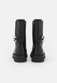 Tamaris Botas con plataforma - black