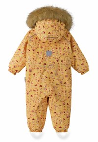 Žlutý voděodolný snowsuit s květinovými vzory, s umělým kožíškem na kapuci, elastickými manžetami a dvěma bočními kapsami. Na hrudi je čtvercová logo nášivka.