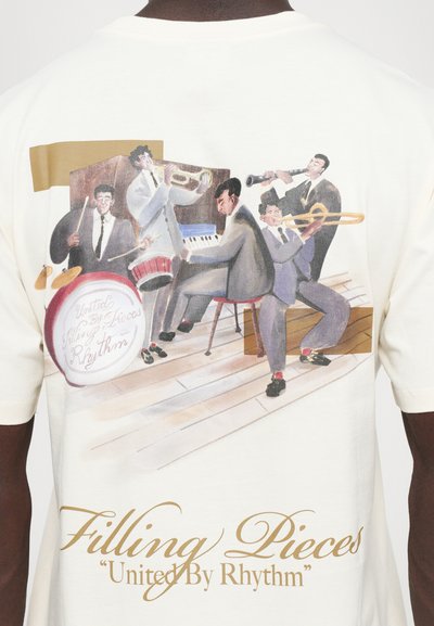 Five musicians playing drums, trumpet, piano, clarinet, and trombone with "Filling Pieces United By Rhythm" text below.