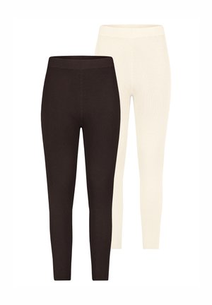 Zwei Paar gerippte Leggings: ein Paar in Dunkelbraun und ein Paar in Off-White. Beide verfügen über einen hohen Bund und eine enganliegende Passform für einen schlanken Look.